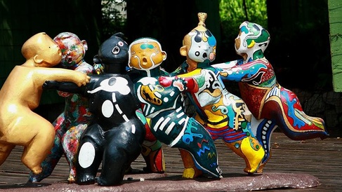 A vibrant sculpture of figures in motion to represent Chinese contemporary culture