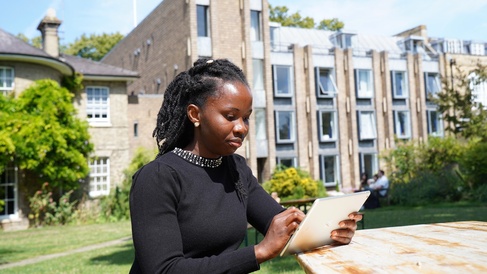 Student using a tablet.